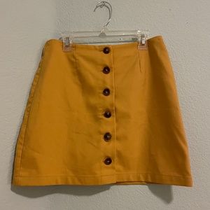 Mustard A line short skirt with buttons